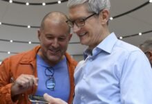 Jony Ive (left) and Tim Cook, Apple’s chief executive, inspect an iPhone in 2017. Photograph: Bloomberg/Getty Images