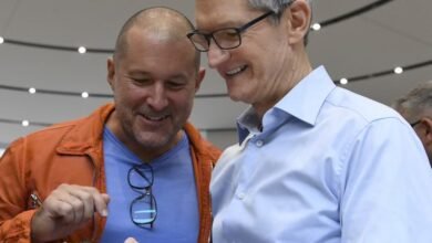 Jony Ive (left) and Tim Cook, Apple’s chief executive, inspect an iPhone in 2017. Photograph: Bloomberg/Getty Images