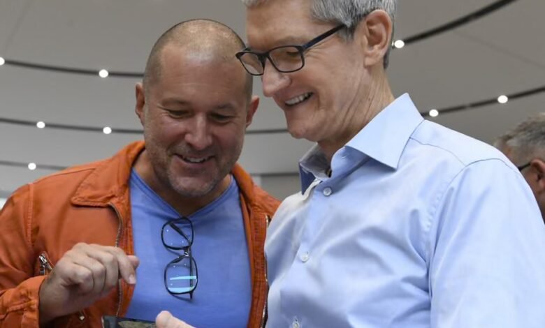 Jony Ive (left) and Tim Cook, Apple’s chief executive, inspect an iPhone in 2017. Photograph: Bloomberg/Getty Images
